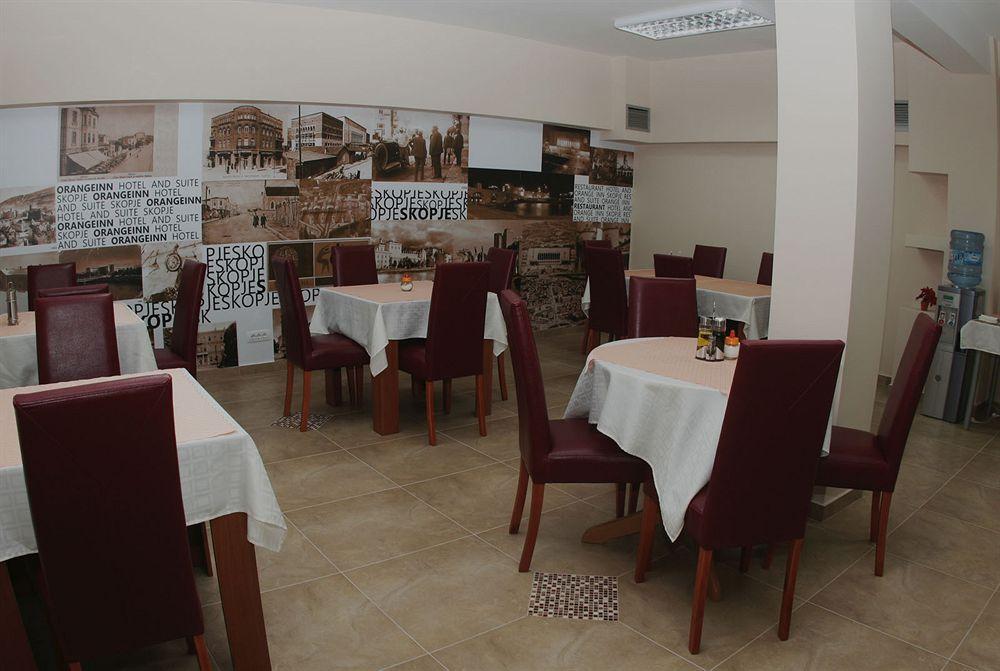 סקופיה Hotel Orange Inn מסעדה תמונה